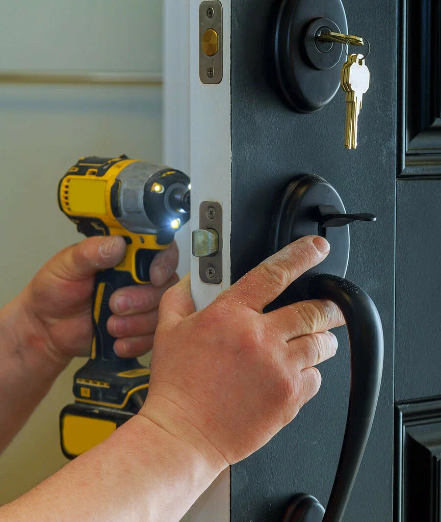 Residential locksmith assisting with home lockout and door lock changes in Baltimore